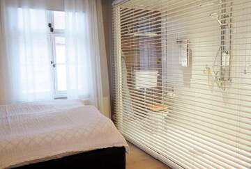 Фото номера Стандартный двухместный номер с 1 кроватью Отель Lillan Hotel Café Butik г. Тампере 7