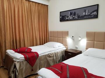 Фото номера Стандартный двухместный номер с 2 отдельными кроватями Отель Hotel Citi Inn г. Тампере 3