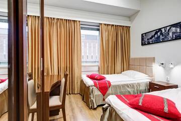 Фото номера Стандартный двухместный номер с 2 отдельными кроватями Отель Hotel Citi Inn г. Тампере 5