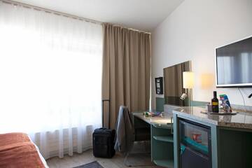 Фото номера Номер с кроватью размера «queen-size» Отель Scandic Rosendahl г. Тампере 9