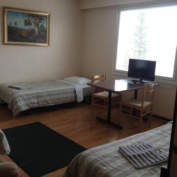Фото номера Трехместный номер с общей ванной комнатой Отель Hotel Lamminpää г. Тампере 7
