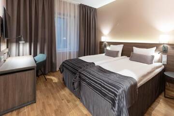 Фото номера Стандартный двухместный номер с 2 отдельными кроватями Отель Scandic Tampere City г. Тампере 2