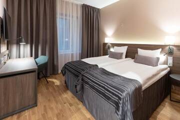 Фото номера Стандартный двухместный номер с 2 отдельными кроватями Отель Scandic Tampere City г. Тампере 7