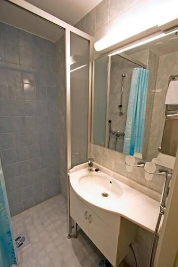 Фото номера Двухместный номер с 1 кроватью Отель Mango Hotel г. Тампере 12